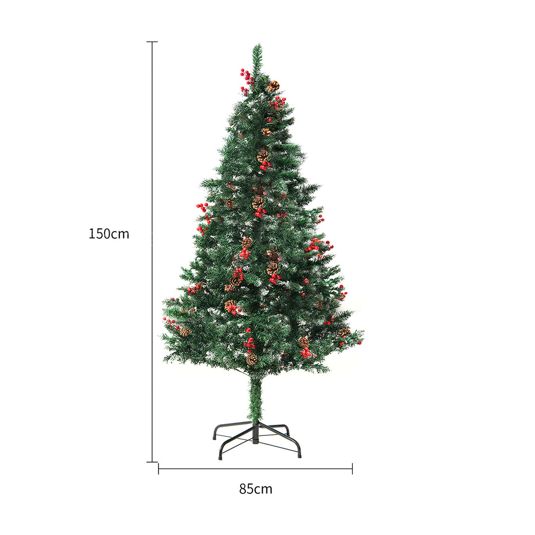 Snow-flocked white Christmas tree with warm-white lights