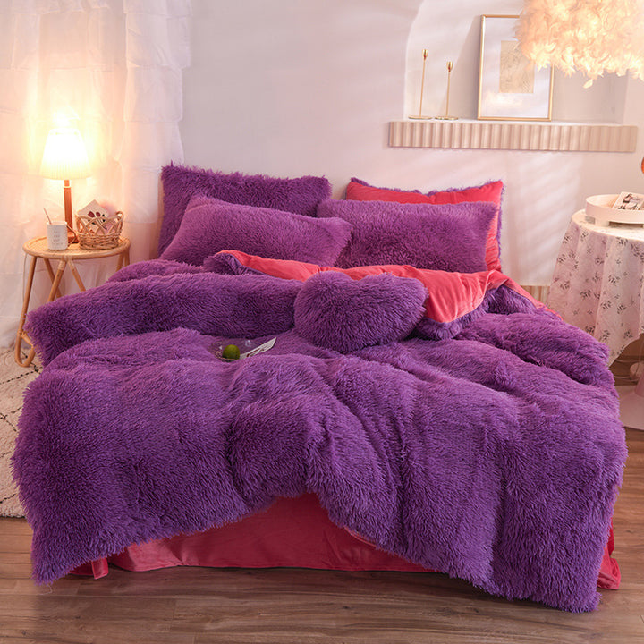 Fluffy plush bedding set on a bed