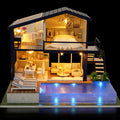 Finished miniature dollhouse with pool