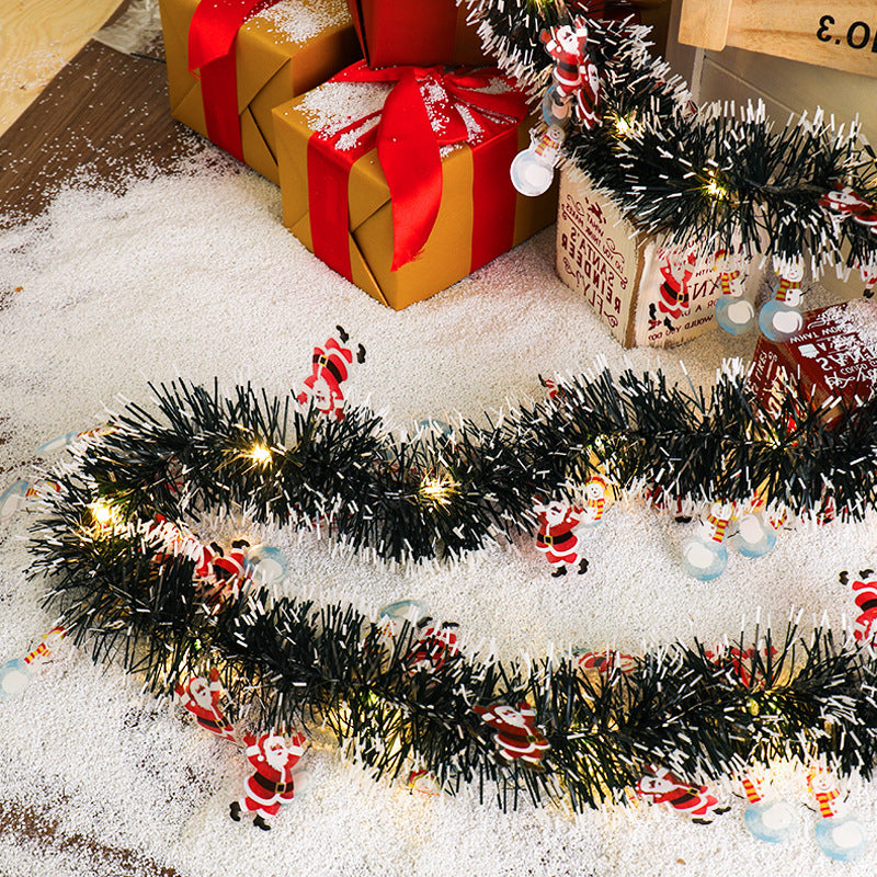 Tinsel garland with LED lights and Santas