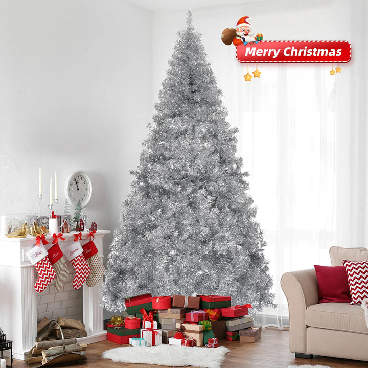 Full silver artificial Christmas tree on a metal stand