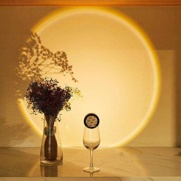 Stick-on push light glowing on a wall