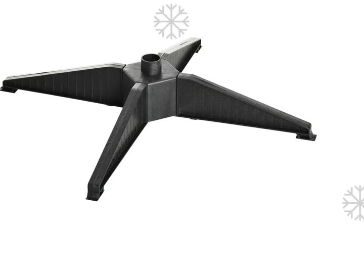 Slim black pencil Christmas tree in corner