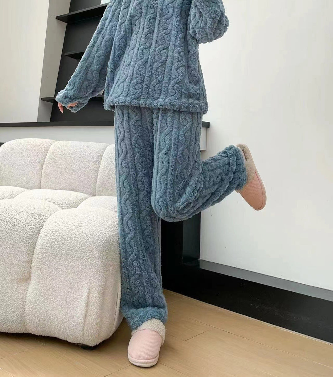 Woman in a half-zip fleece pajama set