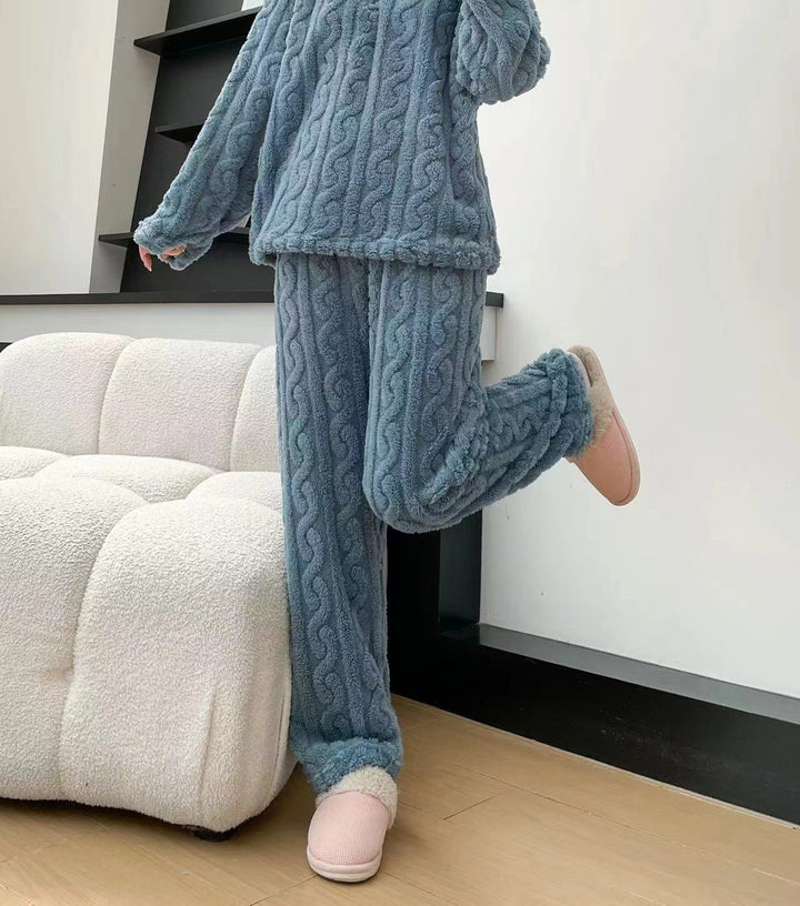 Woman in a half-zip fleece pajama set