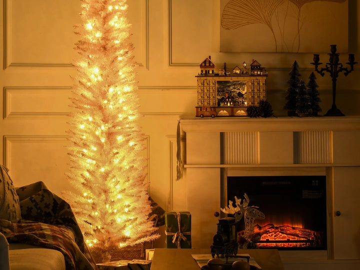 Tall pink pencil Christmas tree with warm lights