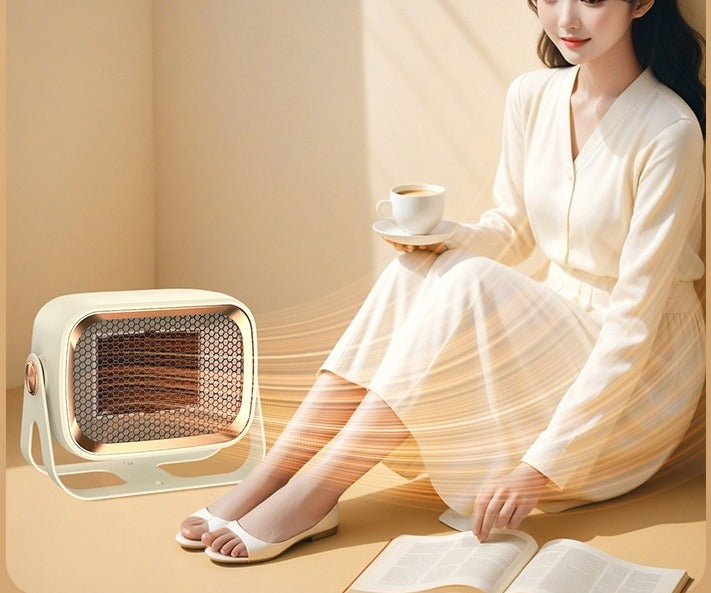 Compact white desktop space heater with tilting head