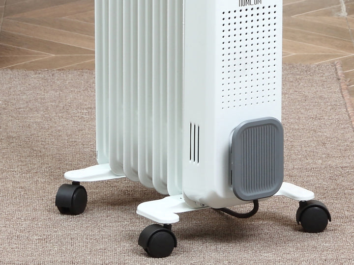 White oil-filled radiator with wheels