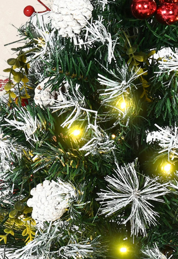 Two small battery lit porch Christmas trees