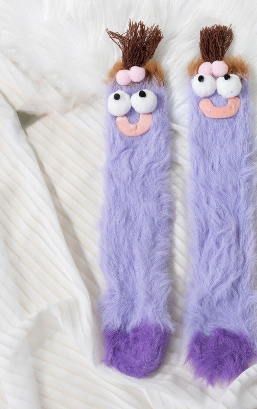 Fluffy purple monster floor socks