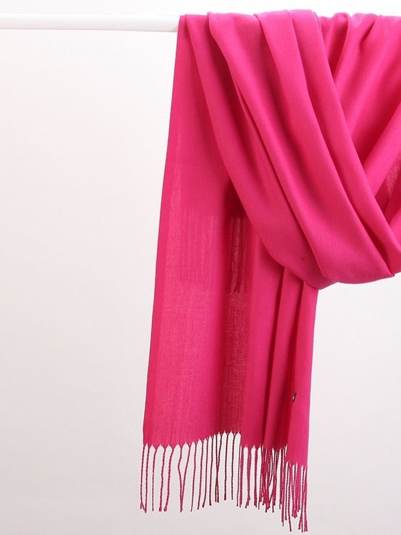 Woman wearing a soft wine red scarf