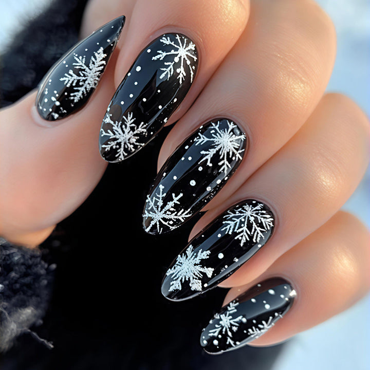 Winter Snowflake Nail Art Design on a Glossy Black Base