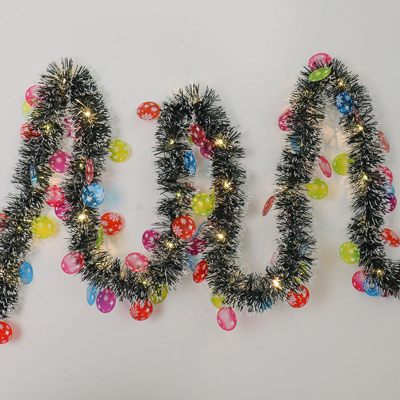 Tinsel garland with LED lights and Santas