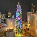 Small flocked pencil Christmas tree lit