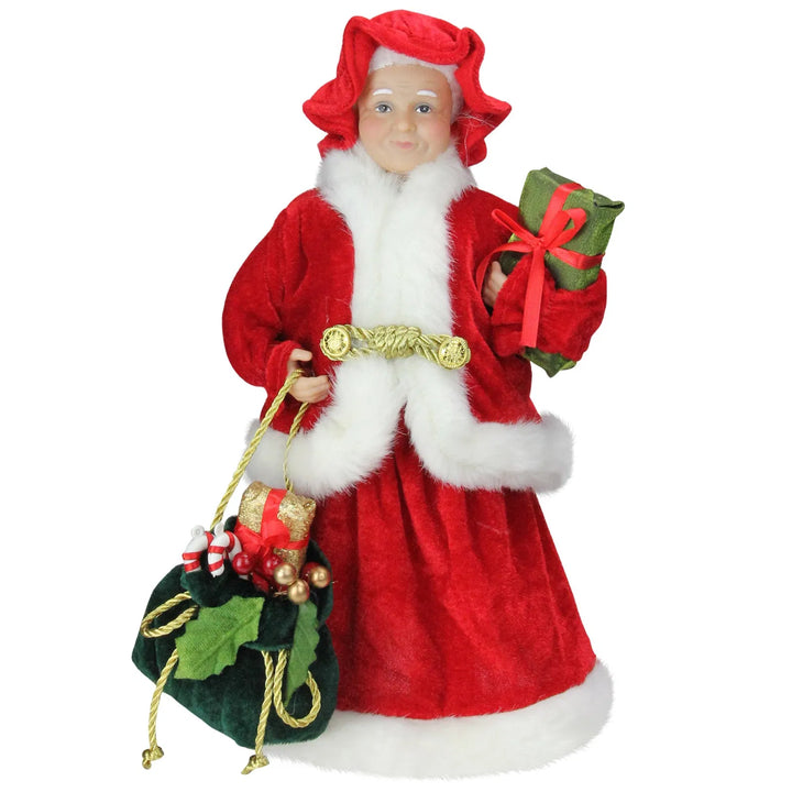 Mrs Claus figure with gift bag