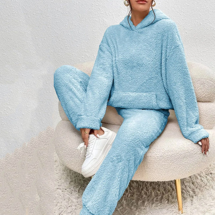 Woman in a fuzzy hoodie lounge set