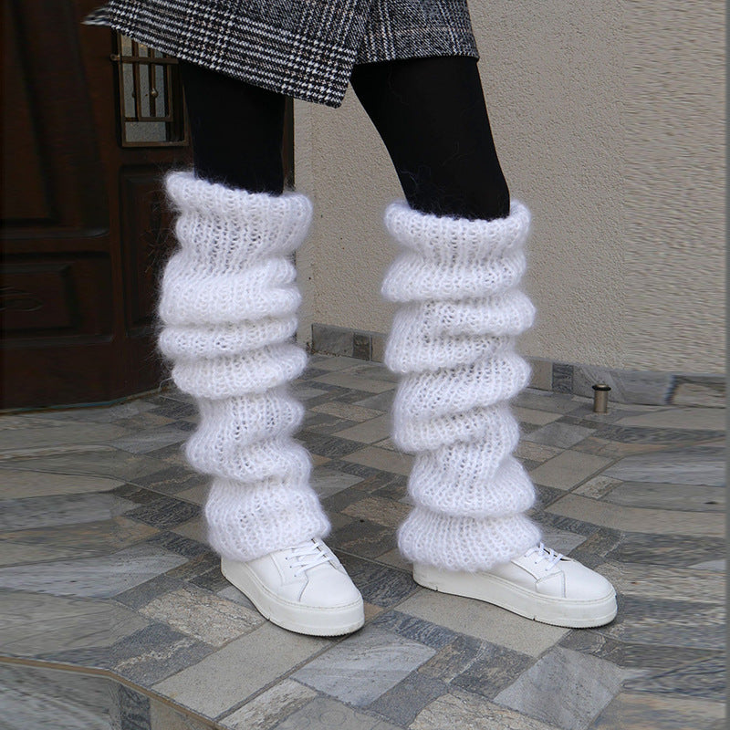 Chunky slouchy knit leg warmers over boots