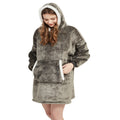 Person wearing an oversized blanket hoodie
