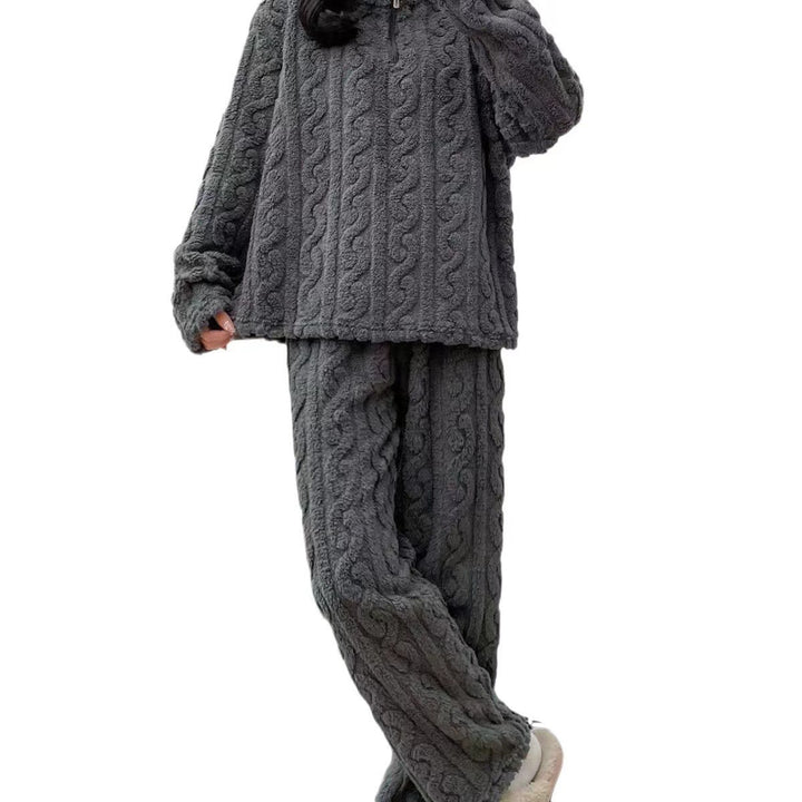 Woman in a half-zip fleece pajama set