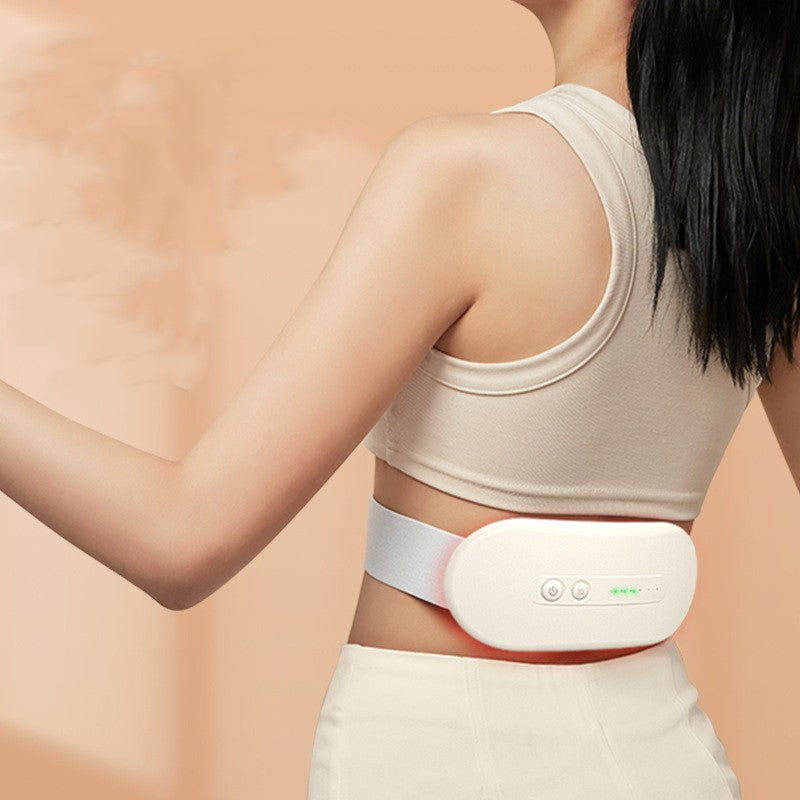 Woman wearing a heated waist belt