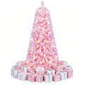 Small pink flocked pre-lit Christmas tree
