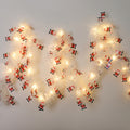 Tinsel garland with LED lights and Santas