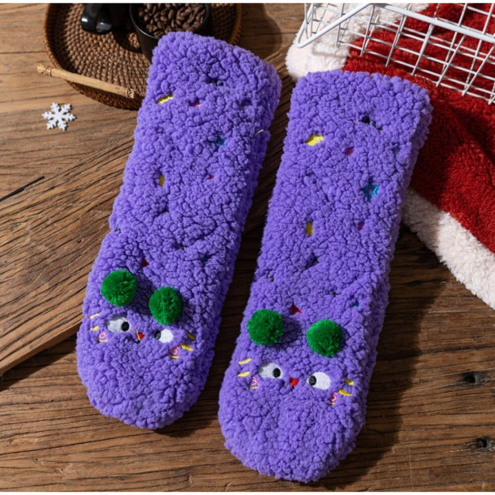 Fluffy pink floor socks with embroidered faces