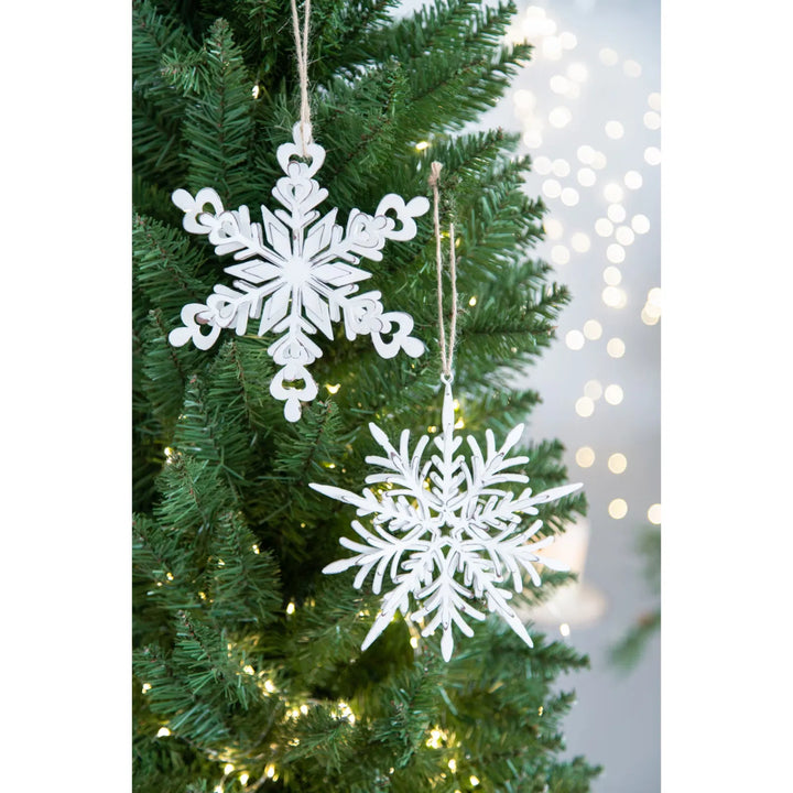 White iron snowflake ornaments with rope hangers