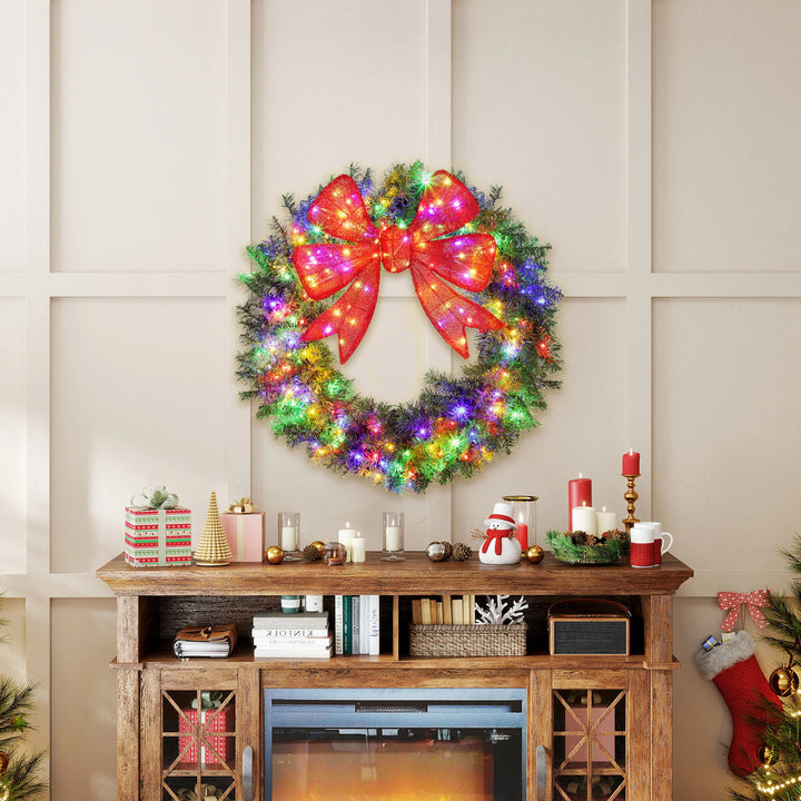 Large lighted Christmas wreath with red bow