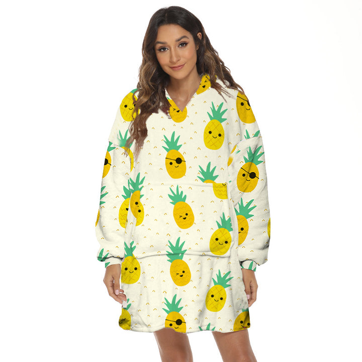 Person wearing oversized hooded blanket