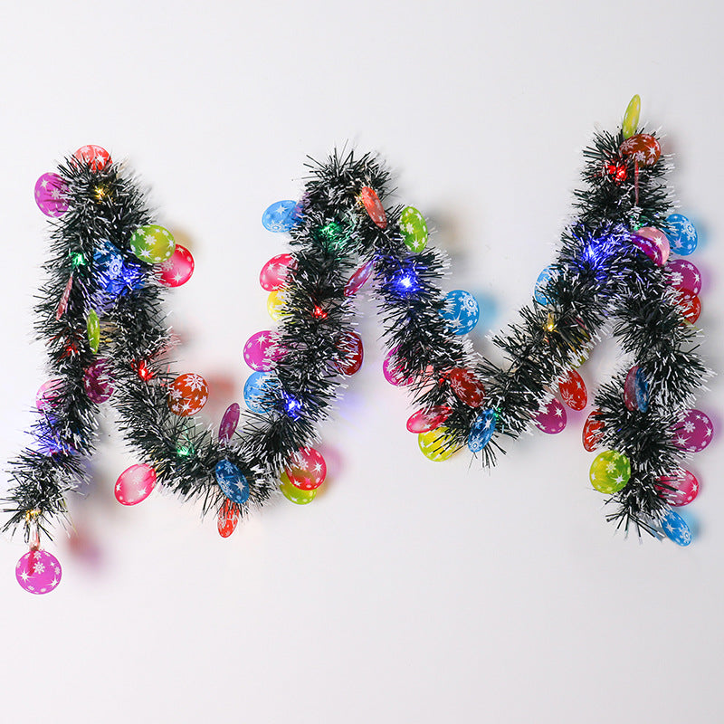 Tinsel garland with LED lights and Santas