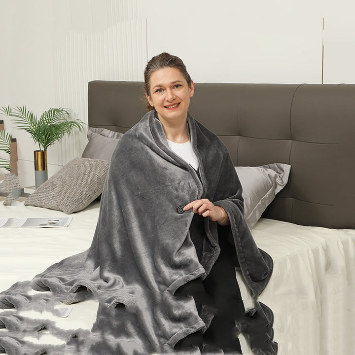 Woman wearing heated flannel shawl
