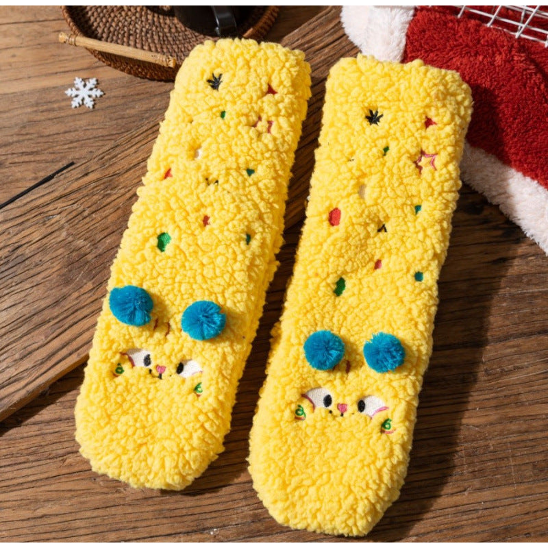 Fluffy pink floor socks with embroidered faces