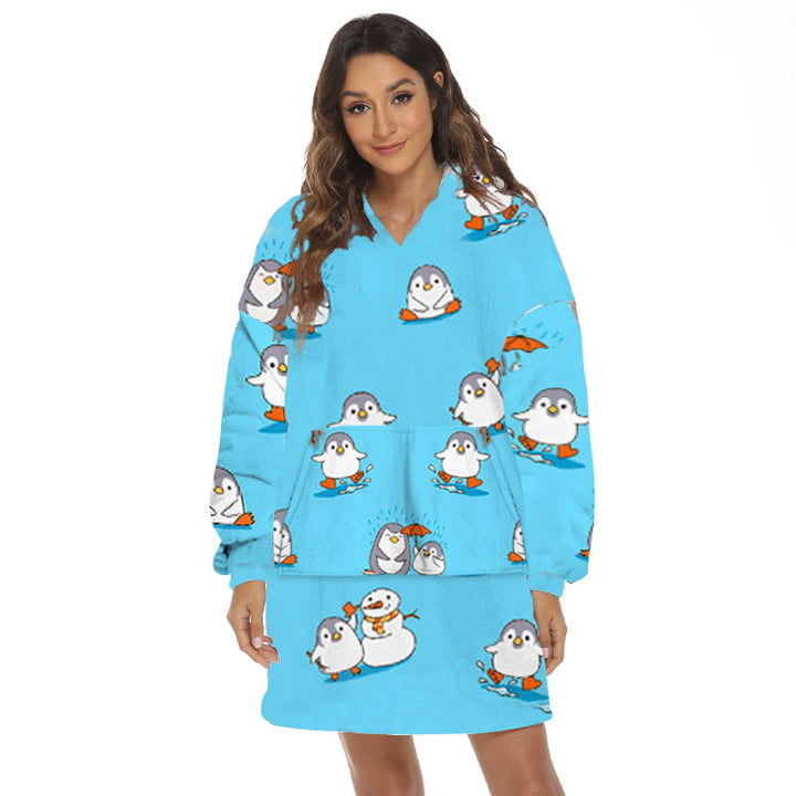 Person wearing oversized hooded blanket