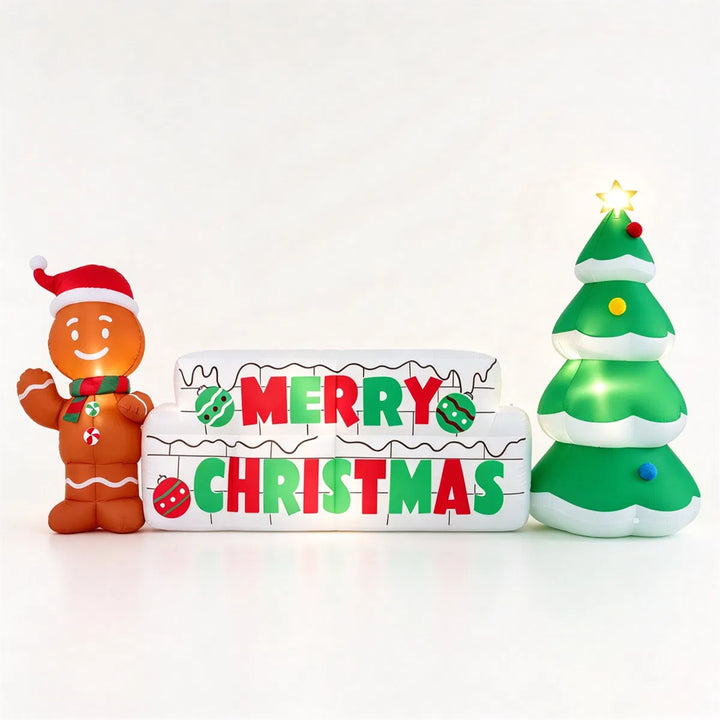 Inflatable Merry Christmas sign with gingerbread man on a lawn